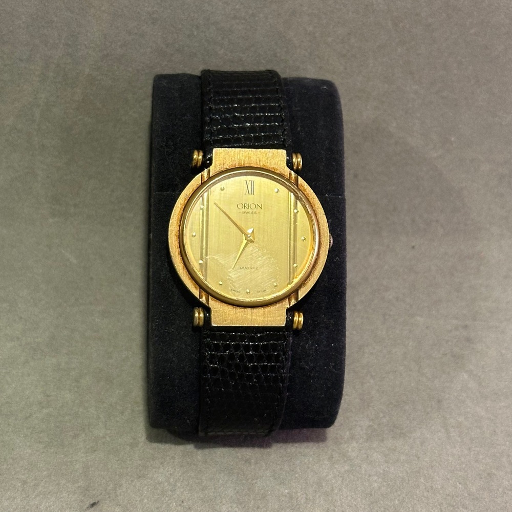 Orion Swiss Quartz Watch Gold Tone Champagne Dial Black Leather Gucci Buckle